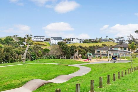 Photo of property in 56 Harrowglen Drive, Northcross, Auckland, 0630