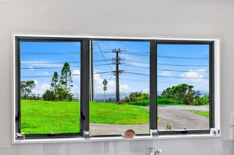 Photo of property in 1/1032 East Coast Road, Fairview Heights, Auckland, 0630