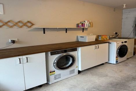 Photo of property in 2/57 Aeroview Drive, Beach Haven, Auckland, 0626