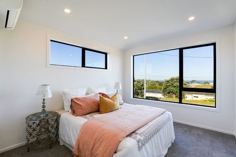 Photo of property in 858d East Coast Road, Northcross, Auckland, 0630