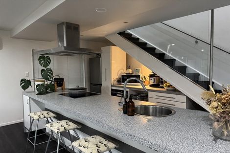 Photo of property in 2/57 Aeroview Drive, Beach Haven, Auckland, 0626