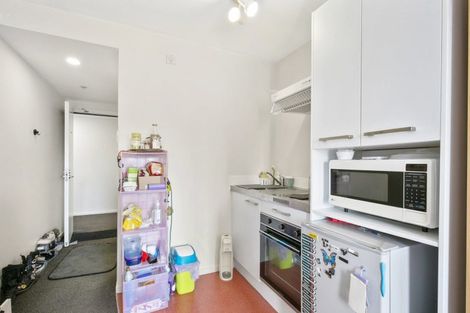 Photo of property in Orange Apartments/victoria Centr, 705/169 The Terrace, Wellington Central, Wellington, 6011