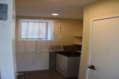 Photo of property in 1/2 Grenadine Place, Unsworth Heights, Auckland, 0632
