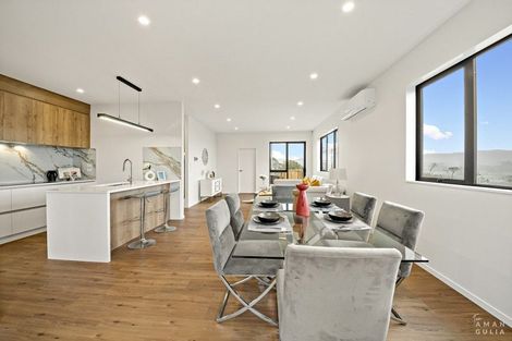 Photo of property in 15 Mara Way, Sunnyvale, Auckland, 0612