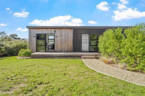 Photo of property in 1119a Whangaparaoa Road, Tindalls Beach, Whangaparaoa, 0930