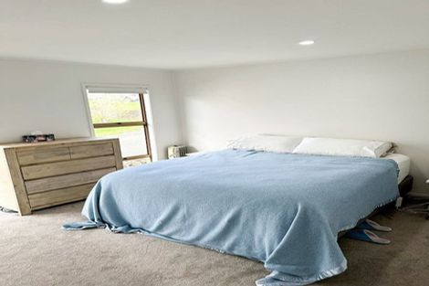 Photo of property in 1/57 Aeroview Drive, Beach Haven, Auckland, 0626