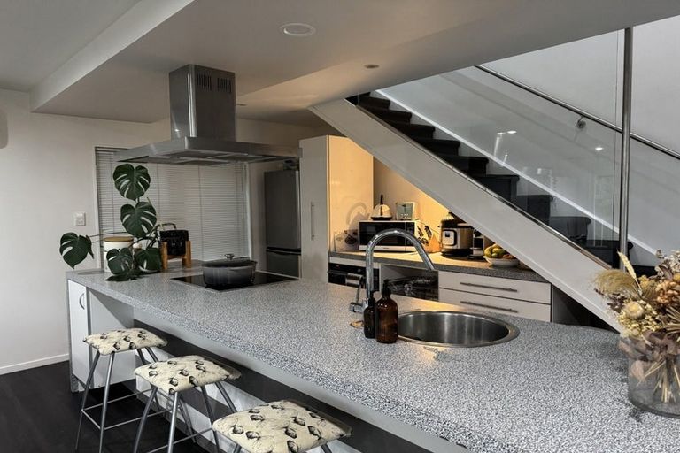 Photo of property in 2/57 Aeroview Drive, Beach Haven, Auckland, 0626