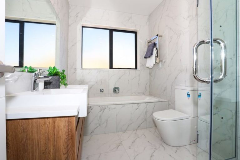 Photo of property in 21 Merv Clarke Lane, Massey, Auckland, 0614