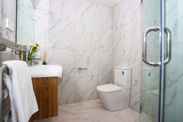 Photo of property in 21 Merv Clarke Lane, Massey, Auckland, 0614