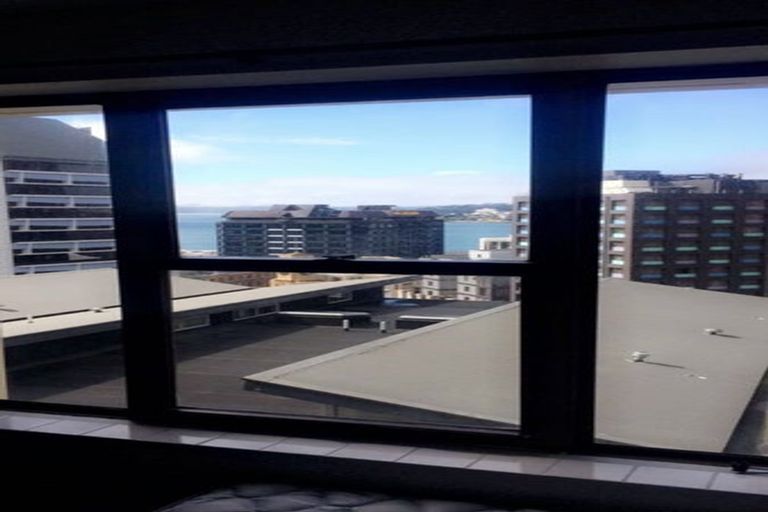 Photo of property in Orange Apartments/victoria Centr, 909/169 The Terrace, Wellington Central, Wellington, 6011